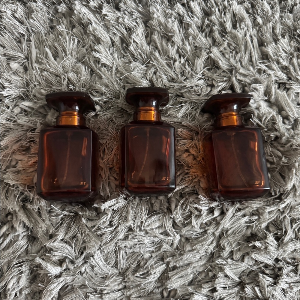 4Empty FENTY EAU DE PARFUM 75mL bottles.